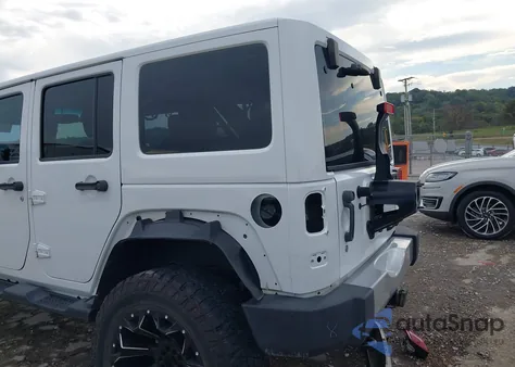 2015 Jeep Wrangler Unlimited Sahara из США, поврежденный, VIN 1C4BJWEG2FL527687